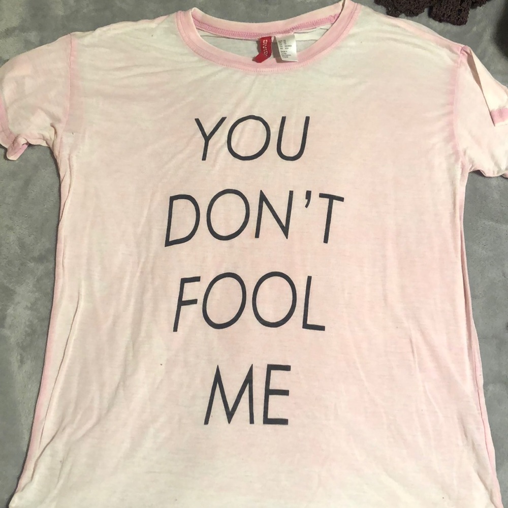 Pink tee shirt.